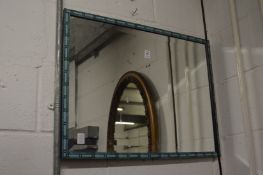 A stylish rectangular mirror.