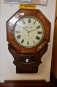 A Victorian mahogany and brass inlaid octagonal shaped drop dial wall clock, the dial signed Morris,