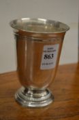 A continental silver beaker.
