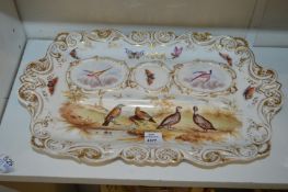 A porcelain desk stand decorated with birds and butterflies.