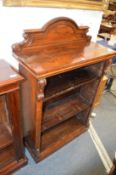 A Victorian rosewood open bookcase.