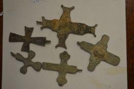 A small group of Roman bronze crosses.