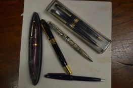 A group of pens.