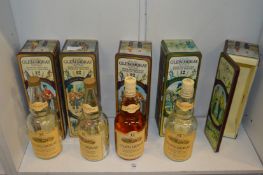 Glen Moray, twelve year old Highland Malt Scotch Whisky in a regimental tin together with similar