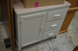 A painted kitchen cupboard.