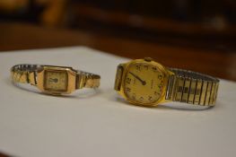 A ladies' 9ct gold cased wristwatch and another watch.