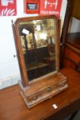 An 18th century walnut dressing table mirror (AF).