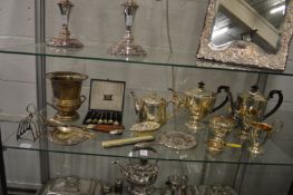 A silver plated four piece tea and coffee service and other plated wares.