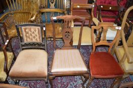 Three various dining chairs.
