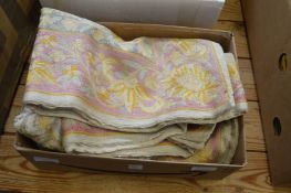 A crewel work bed cover.