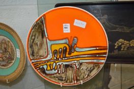 A Poole Pottery Delphis plate.