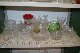 Two shelves of glassware.