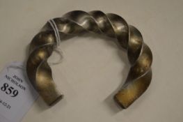 An unusual stainless steel torque bangle (made by Mick Griffiths).