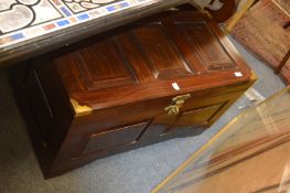 A Chinese brass bound rosewood coffer.