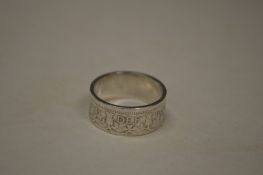 An unusual ring made from a 1954 two shilling coin, size V (made by Mick Griffiths).