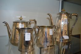 A plated four piece tea and coffee service.