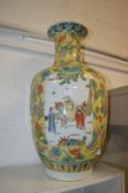 A large Chinese Famille Jaune vase.