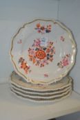 Five floral decorated plates.