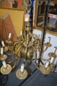 A good large brass Dutch style twelve branch chandelier.