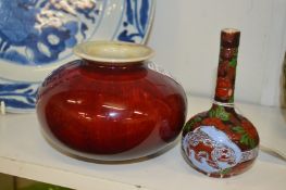 A small Chinese flambe vase and a little bottle vase.