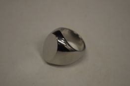 An unusual stainless steel gent's signet ring, size O1/2 (made by Mick Griffiths).