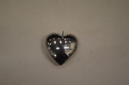 An unusual stainless steel heart shaped pendant (made by Mick Griffiths).