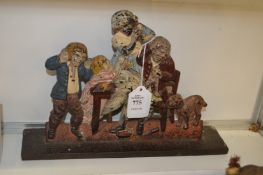 An amusing Victorian painted cast iron door stop.