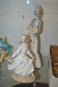 Two Lladro figurines.
