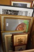 A quantity of paintings and prints.