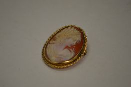 A cameo brooch.