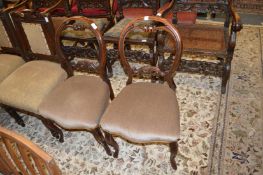 A pair of Victorian mahogany balloon back dining chairs.
