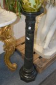A 19th century marble three section pedestal column (faults).