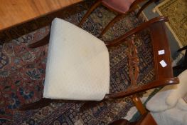 A set of four Regency style mahogany dining chairs.