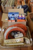 A box of extension cables and a box of light bulbs.
