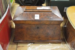 A Victorian burrwood sarcophagus shaped tea caddy.