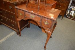 A George III mahogany lowboy.