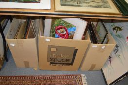 A quantity of paintings and prints.