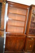 A Victorian mahogany cupboard bookcase.