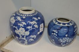 Two Chinese blue and white prunus jars, lacking covers.