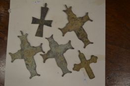 A group of Roman bronze crosses.