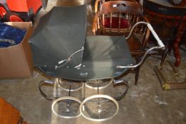 A Silver Cross pram .
