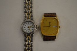Two wristwatches.