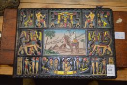 A coloured, embossed leather Egyptian revival photograph album.