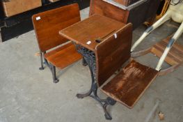 A school desk with similar chair.
