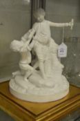 A Parian ware group of two playful children on a gilt wood base.