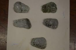 Five Chinese carved hardstone amulets.