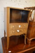 A pair of mahogany two drawer bedside tables.