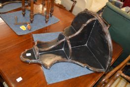 A pair of decorative painted three tier demi-lune wall brackets.