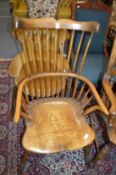A modern ash and elm Windsor style armchair.