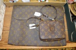 A designer style folio case and evening bag.